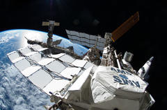 space station experiment is close to proving the existence of dark matter, the cosmic glue that binds the universe
